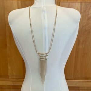 Long faux gold necklace with glass/faux diamond accents